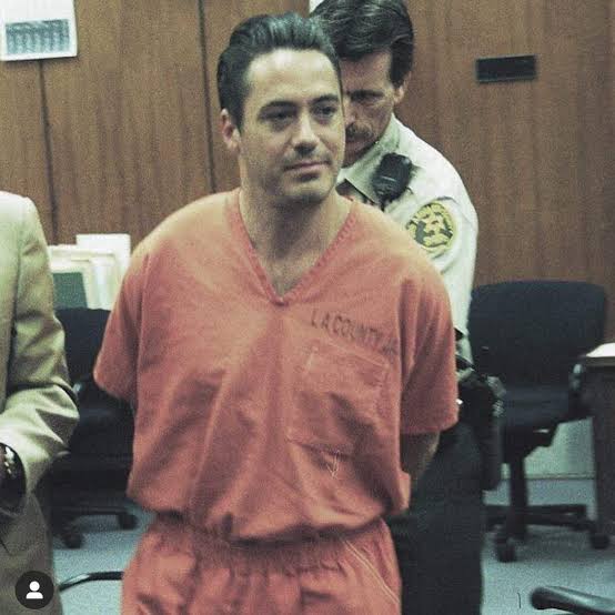 Robert Downey Jr. in an orange LA County jail jumpsuit at his 1999 court appearance